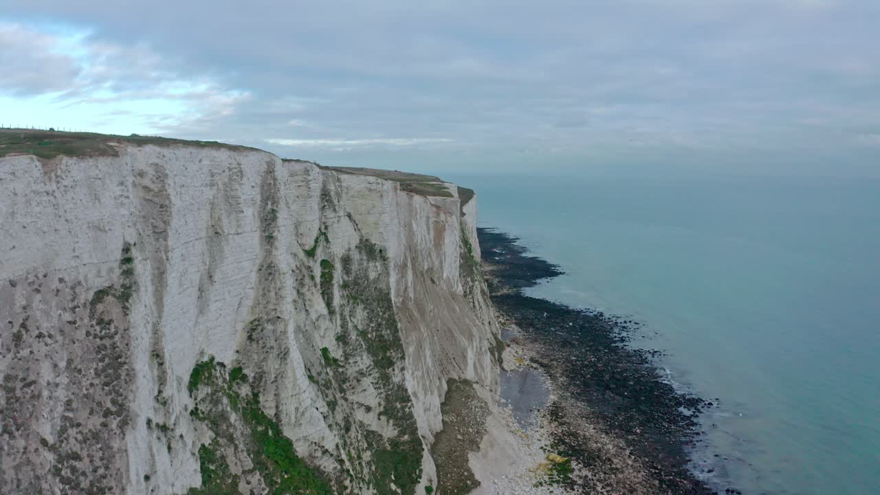 Close up aerial shot along the white cliffs of dover