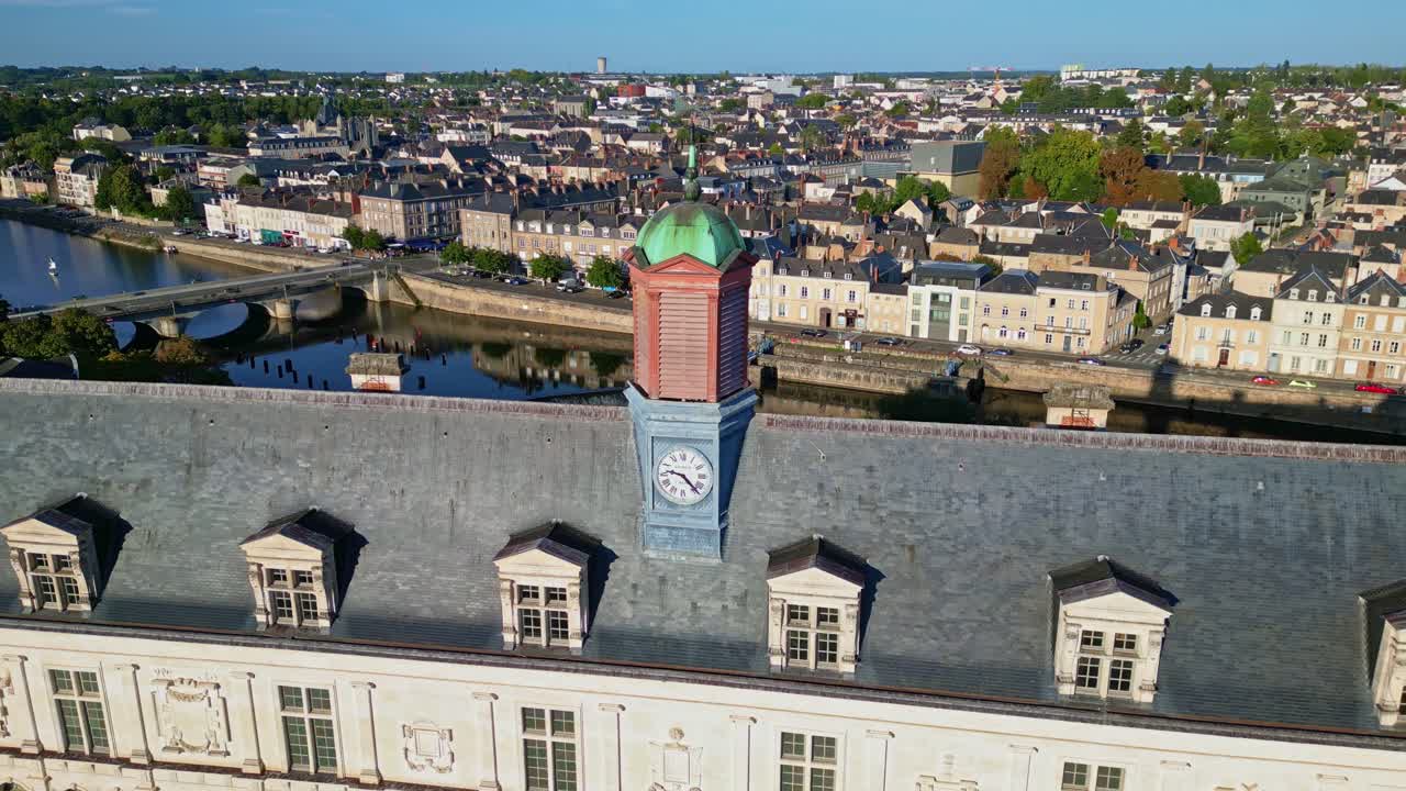 Château-Neuf clock tower in Laval, France. Aerial backward, cityscape