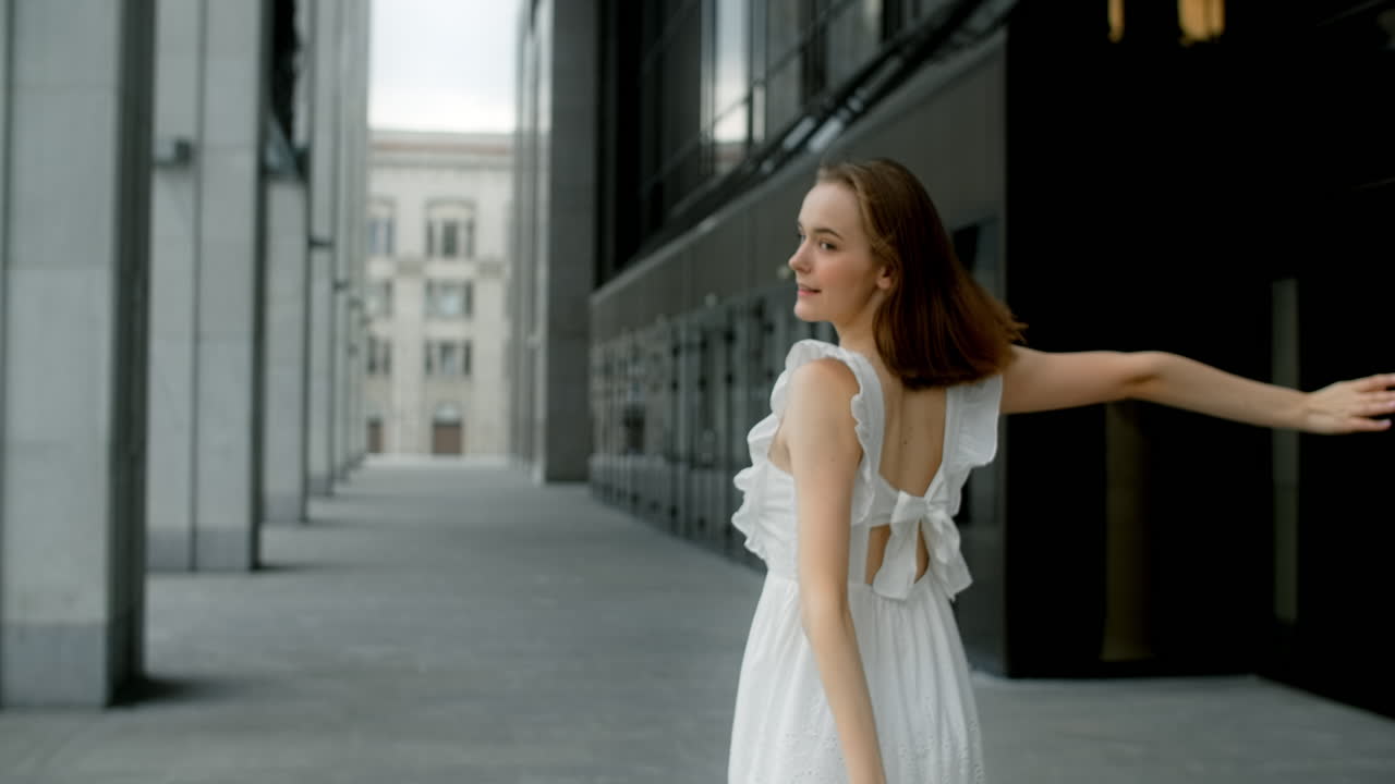 Young Woman Dancing in City