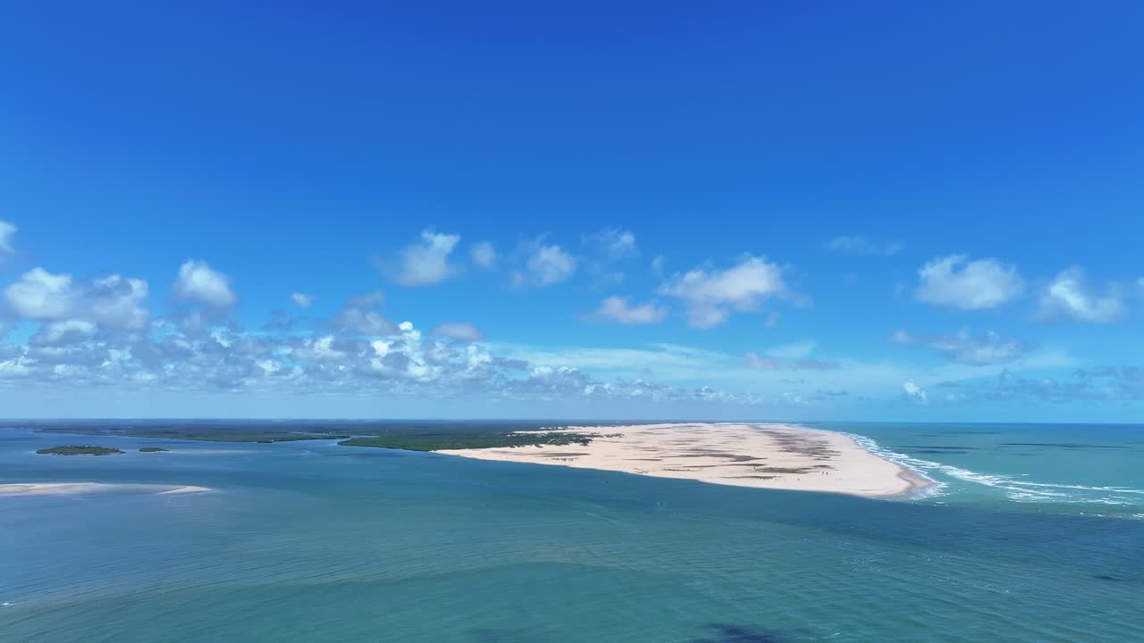 Drone view of the mouth of the São Francisco River. Meeting of the freshwater River with the Atlantic Ocean on the border between Alagoas and Sergipe in Brazil
