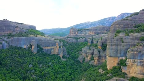 Aerial-Flying-Toward-Roca-del-Corb-Rock-Formation-Mountain-In-The-Pyrenees-In-Spain