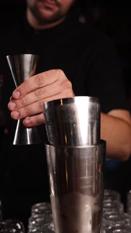 bartender pouring cocktail