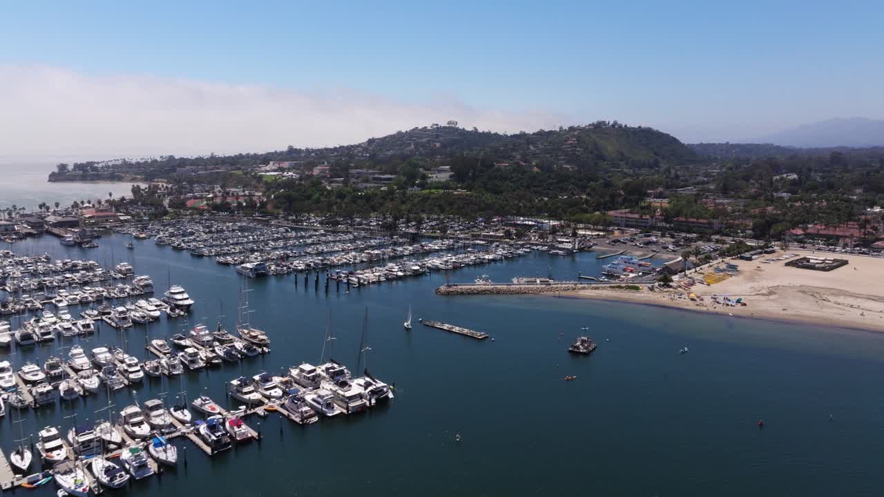 Aerial View of a Bustling Marina and Beach