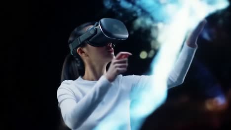 an enthusiastic user engages in an immersive virtual reality experience, manipulating colorful visual effects with a controlled motion as the digital world unfolds