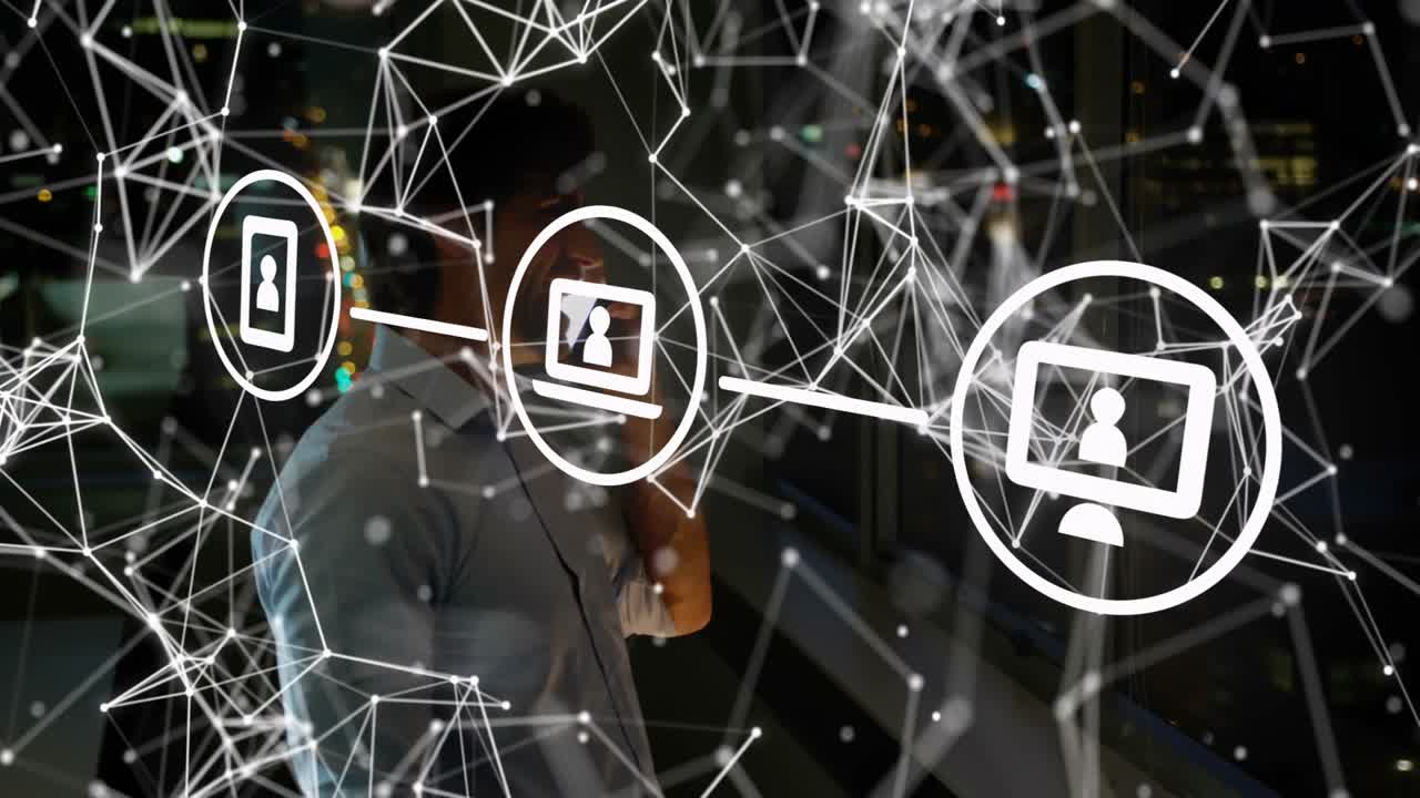 business man standing near glass window, showing network linking smartphone, laptop, desktop icons