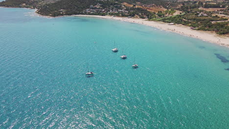 aerial sardinian crystal sea bay at summer