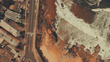 Colourgraded,-warm-Aerial-Birds-Eye-POV-over-urban-beach