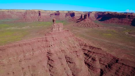 Remarkable-aerial-through-the-buttes-and-rock-formations-of-Monument-Valley-Utah-3