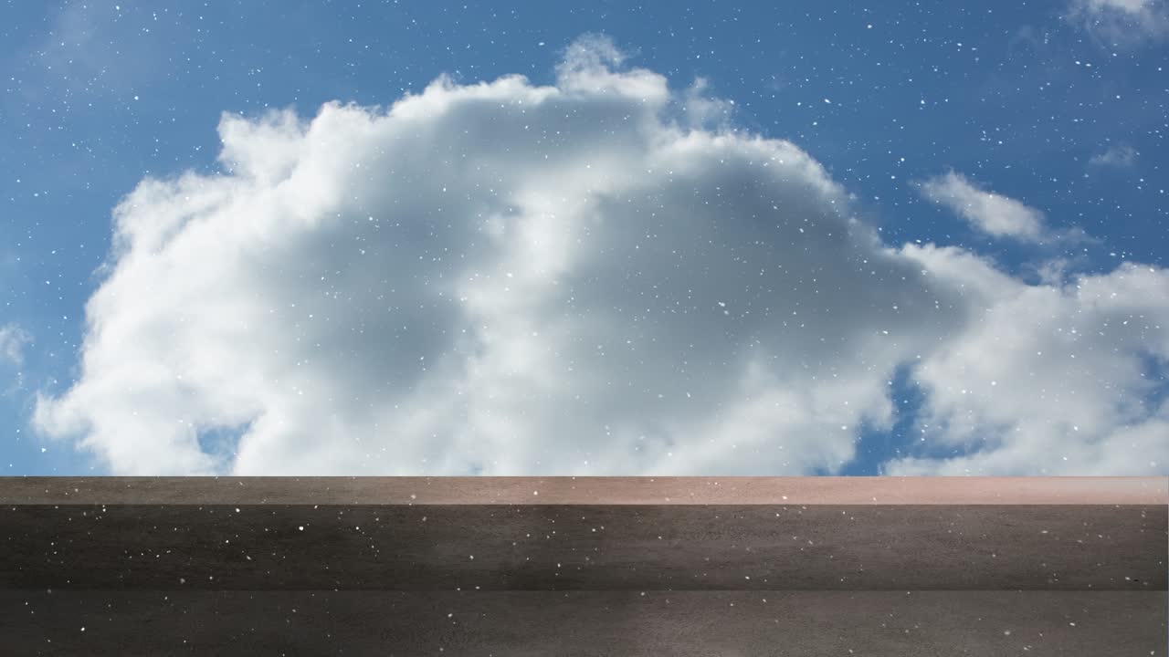 Animation of snow falling over sky with clouds at christmas