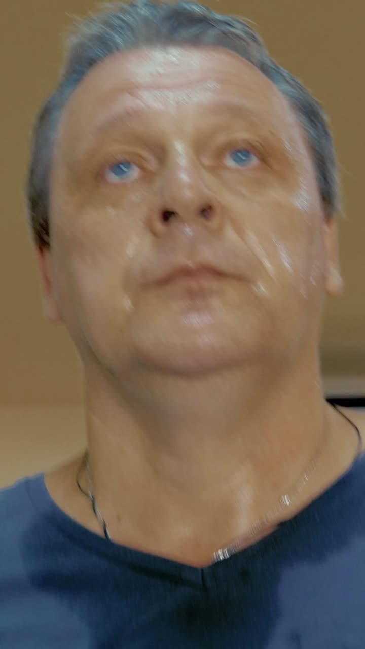 A sweaty man's face