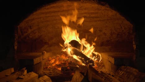 glowing fire flames at the vintage fireplace