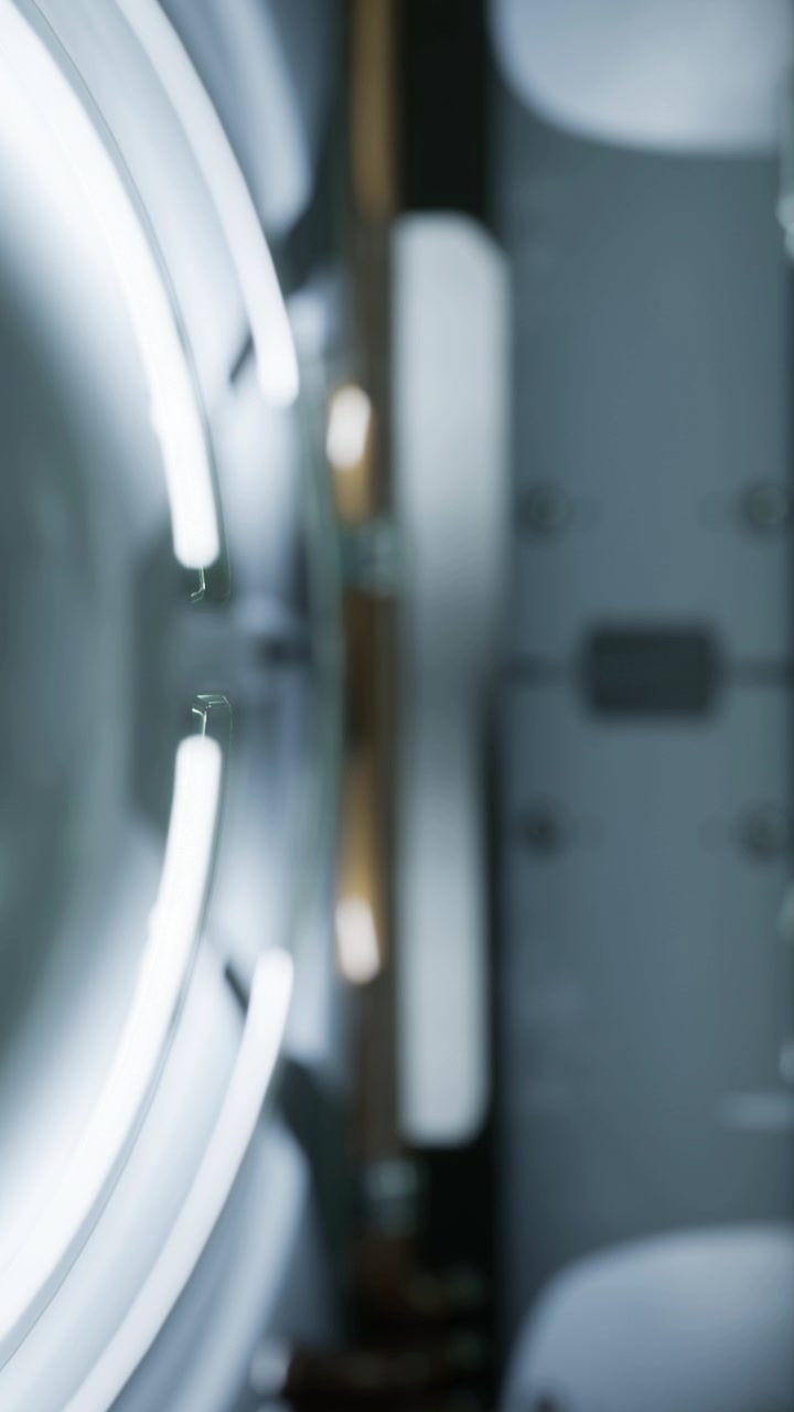 Light tubes in a circular arrangement on a wall in a modern space
