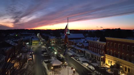 snow covered american town during sunset