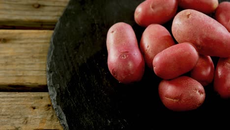 Sweet-potatoes-on-concrete-broad-4k