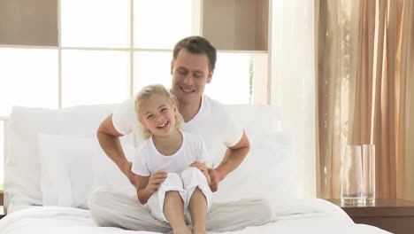 father and daughter in bed