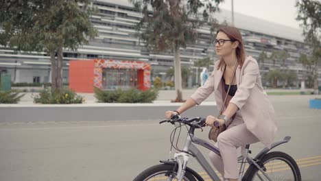 woman cycling in a city