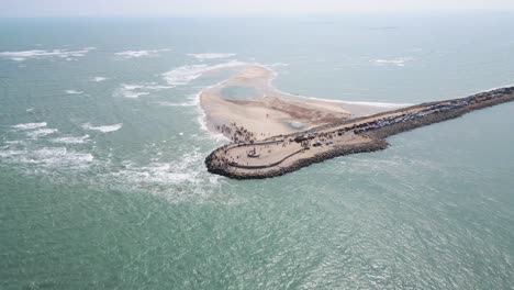 aerial drone shot of dhanushkodi’s famous last road, where history meets the stunning coastal landscape.