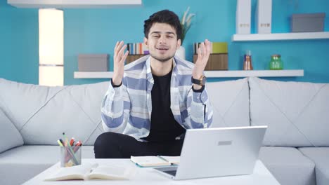 Young-man-talking-while-looking-at-camera-is-cheerful-and-happy.