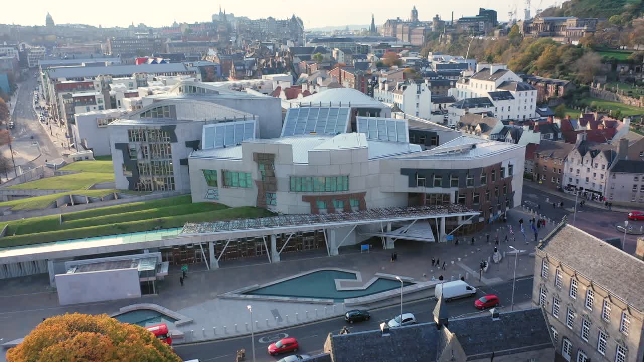 A slow pan out from the entrance of the Holyrood Scottish Parliament to see Edinburgh Castle, Calton Hill and the city centre | Edinburgh, Scotland | 4K at 30fps
