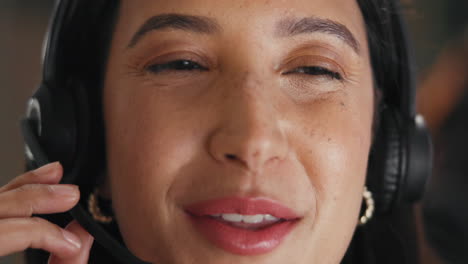 close-up of woman with headset smiling