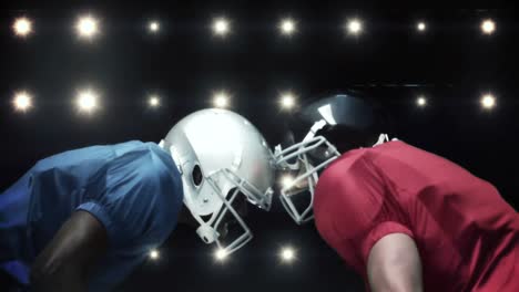 American-football-players-against-flashing-lights