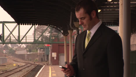 man waiting for train