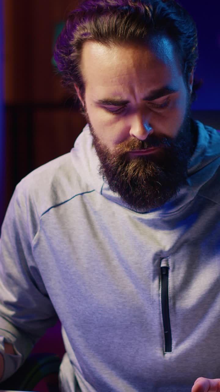 Vertical video Pro gamer doing livestream, presenting viewers his favorite esports strategies
