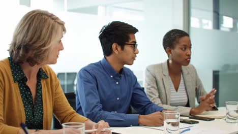 engaging discussion among diverse professionals at a business meeting: collaboration, ideas, and strategies for success