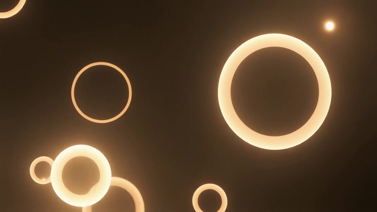 Abstract Animation of Glowing Golden Rings Floating in Dark Space