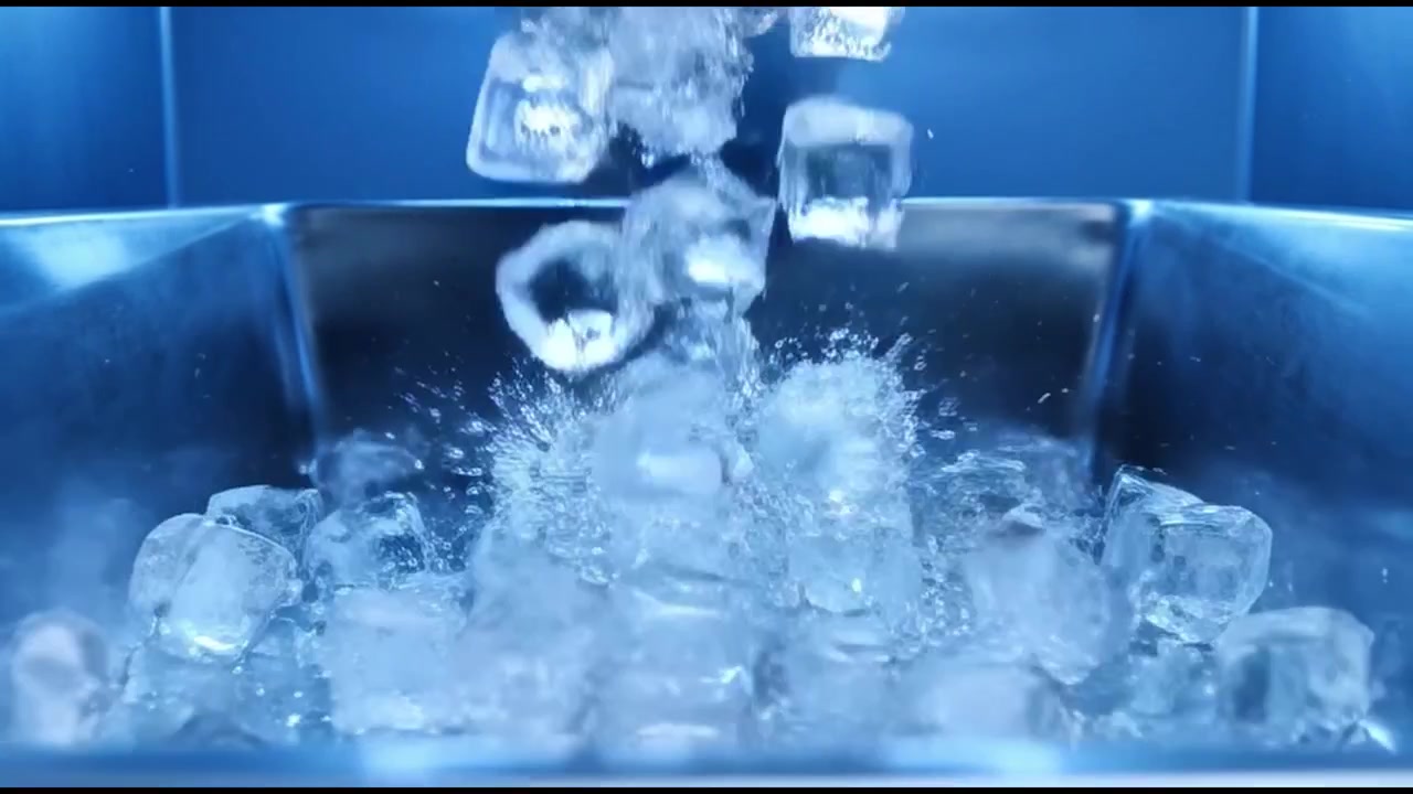 Ice Cubes Falling into a Metal Container
