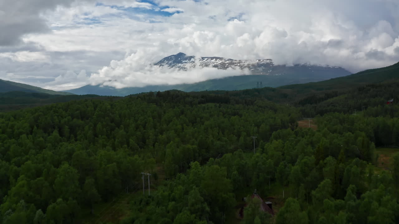 Aerial drone over the green majestic landscape in the Lofoten Islands, Norway.