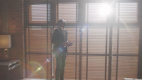 black businessman using smartphone in office