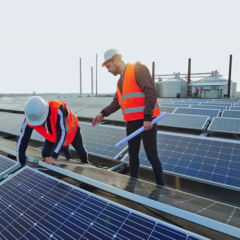 engineers checking solar panels