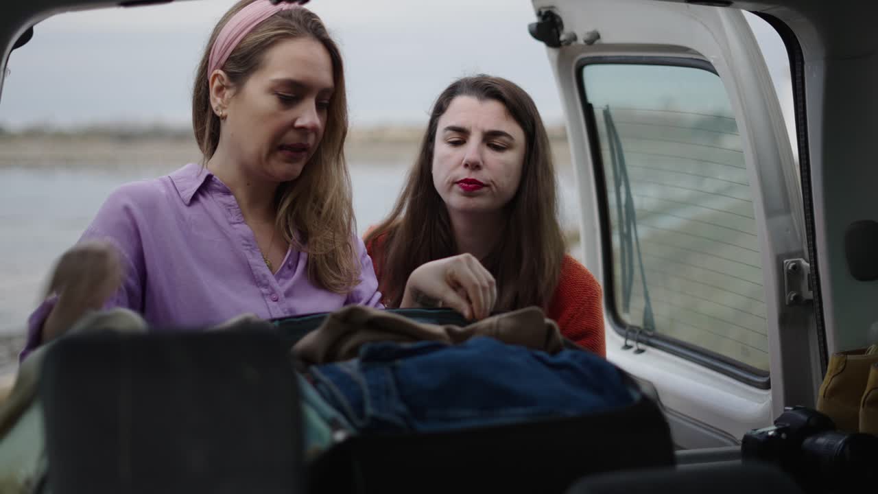 Friends Packing for a Trip