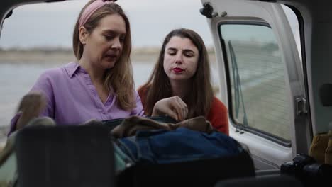 friends packing for a trip