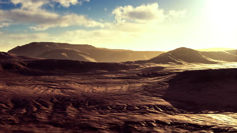 golden sunlight bathes rugged mountains in a serene landscape during twilight