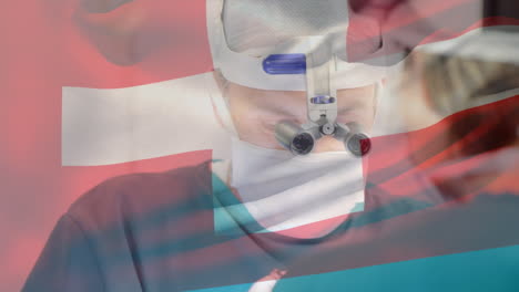 animation of flag of switzerland waving over surgeons in operating theatre