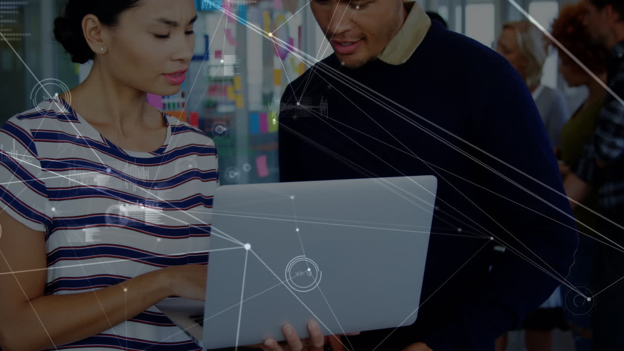 Animation of network of connections over diverse male and female office colleagues discussing