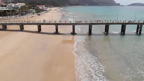 people stroll on madeira city pier