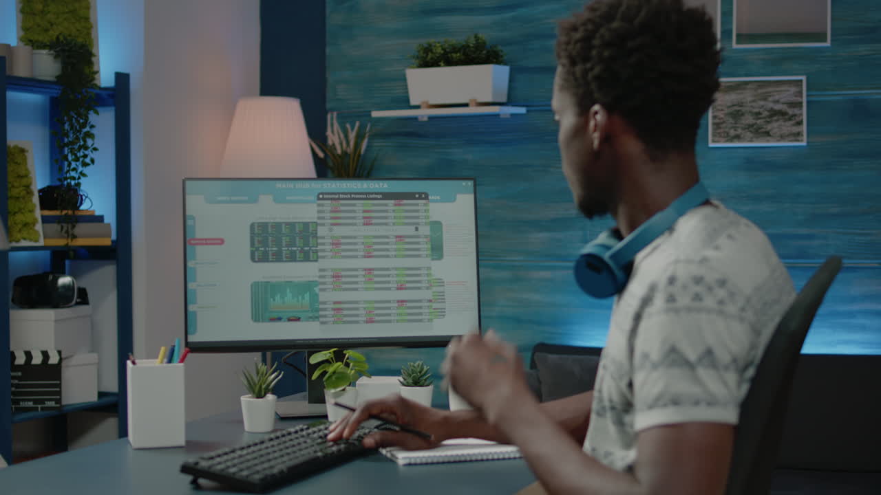 Person writing crypto currency data on notebook