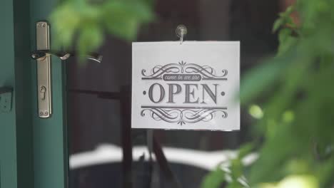 open sign on a door