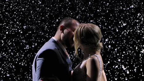 couple kissing in the snow