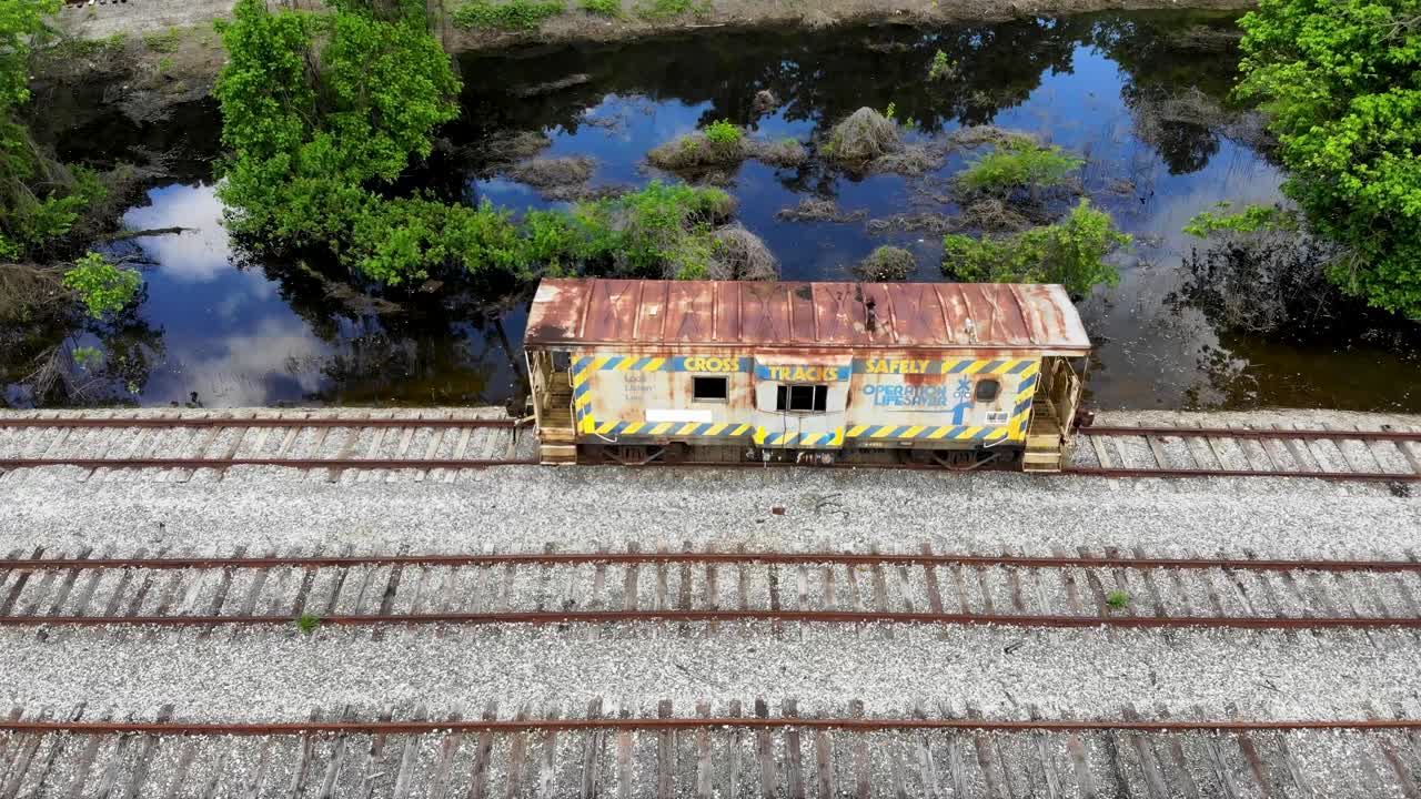 Lone railroad car abandoned and forgotten in time. 30 fps at 4k