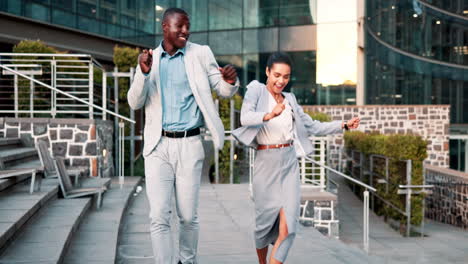 business colleagues dancing on stairs