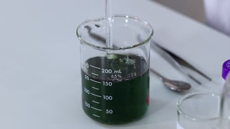 color-changing chemical reaction in a beaker