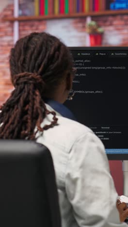 vertical video admin writing artificial intelligence code on computer