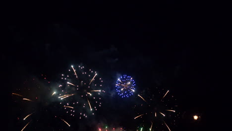 Red,-white-and-blue-fireworks-explode-in-the-sky