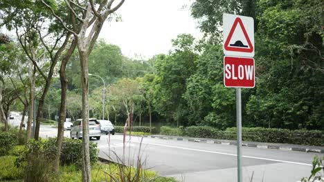 slow down sign on street in singapore