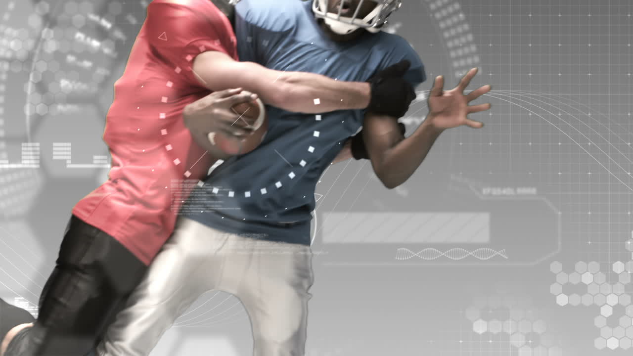 American football players tackling for ball