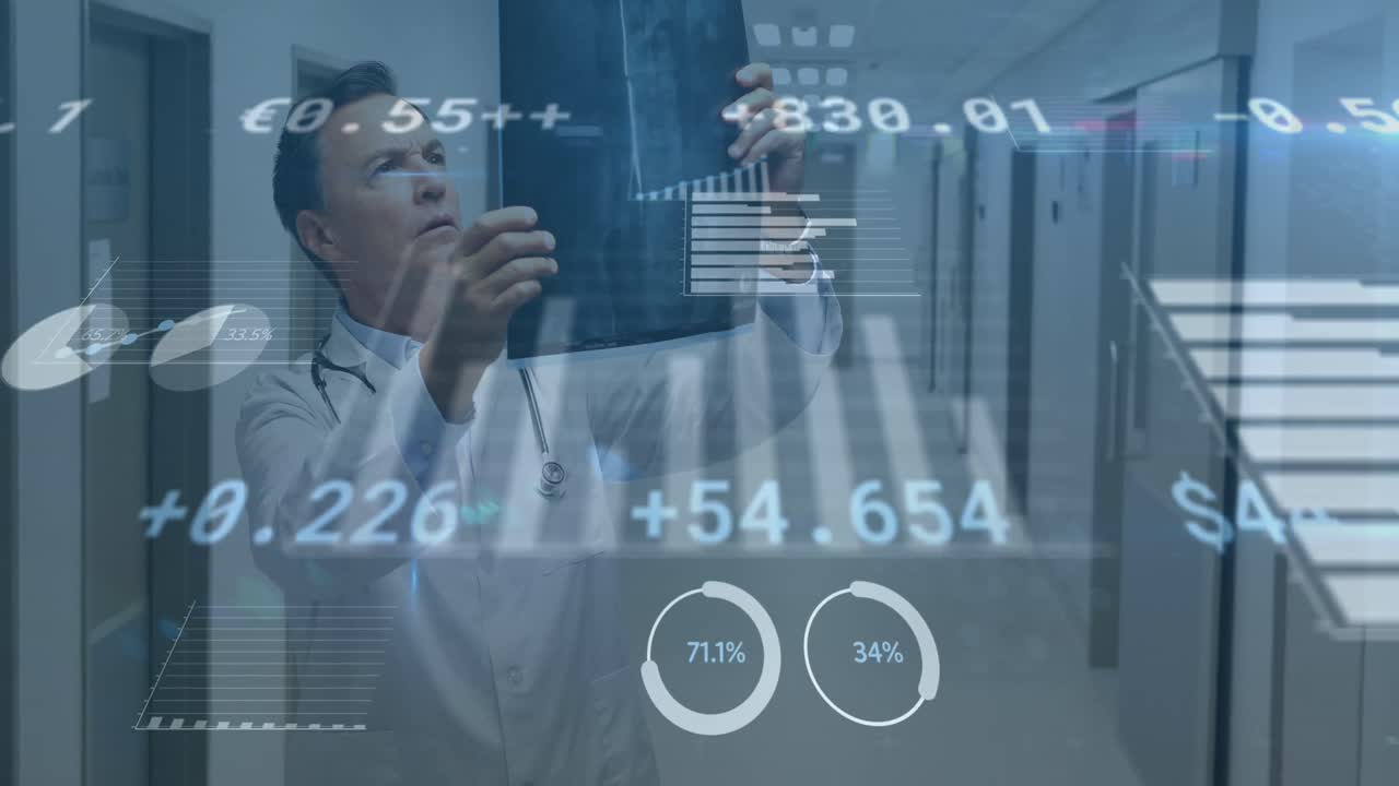 Animation of financial data processing over caucasian male doctor with x ray scan